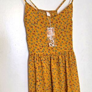 Romwe flowered sundress. New with tags. Size small. Spaghetti straps. Unlined.
